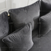 Sofá de tela gris de lujo con estructura de metal