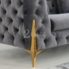 Sofá de sala de estar de tela Chesterfield con patas doradas