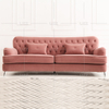 Sofá de salón clásico pequeño rosa con taburete